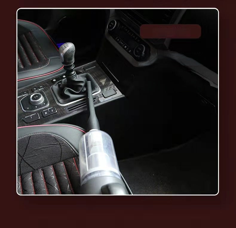 Cleaning car seats and foot mats with the portable handheld vacuum cleaner.