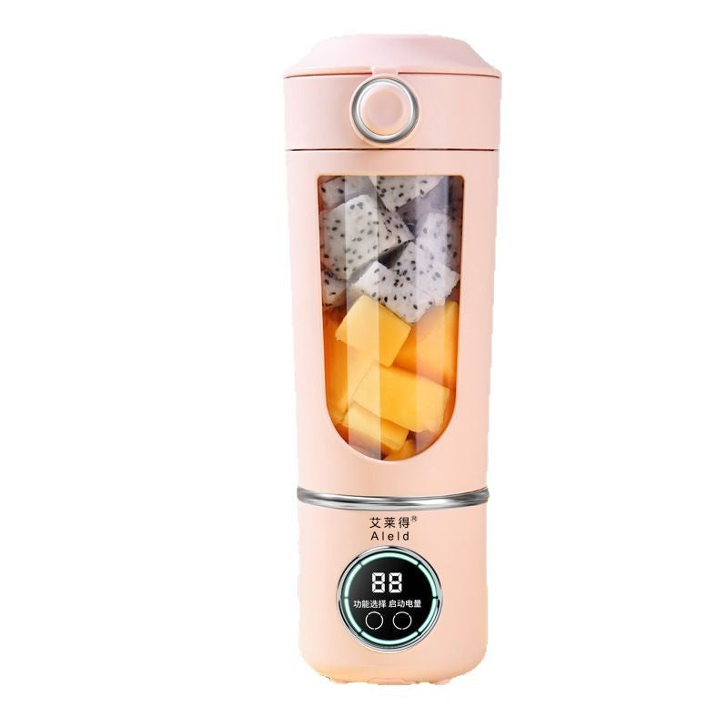 Portable rechargeable blender with 700ml capacity bottle, perfect for smoothies on the go.